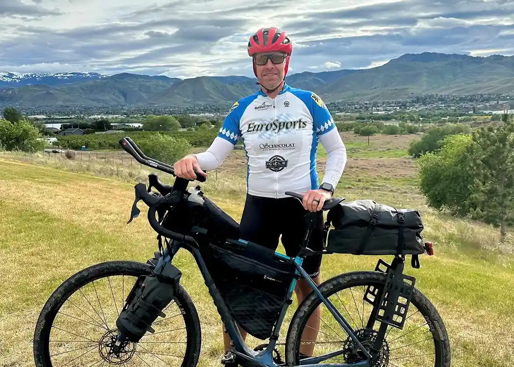 A bike rider with his bike